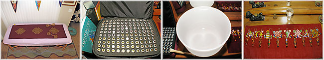 Reiki table with copper-grid mat, essential oils crystal bowl and healing crystals